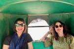 2-women-in-green-cab